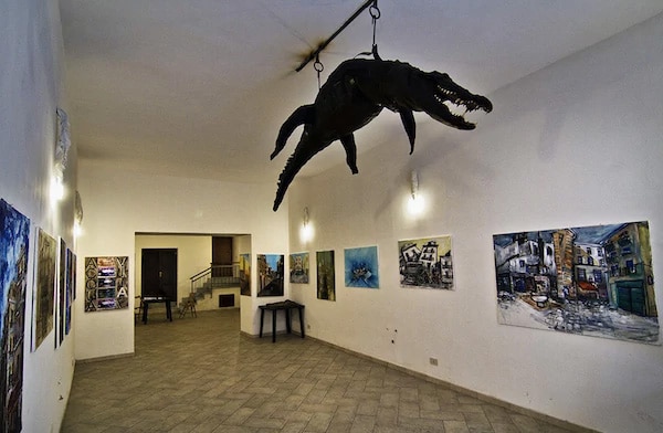 the crocodile, hanging from the ceiling