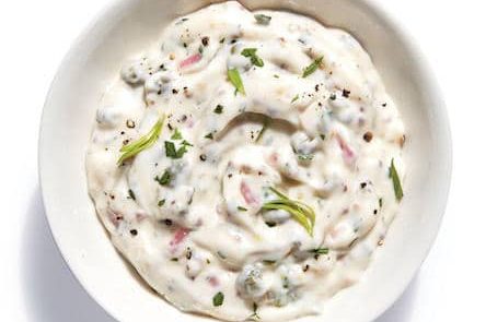 bowl of yogurt with stuff or remoulade